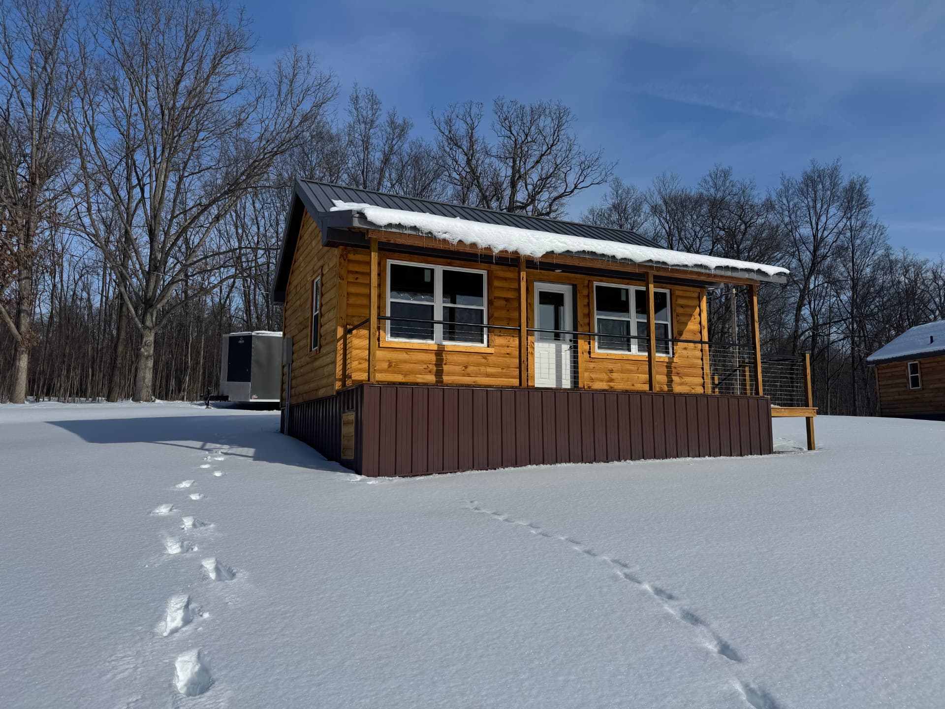 Greenway cabin front porch in winter