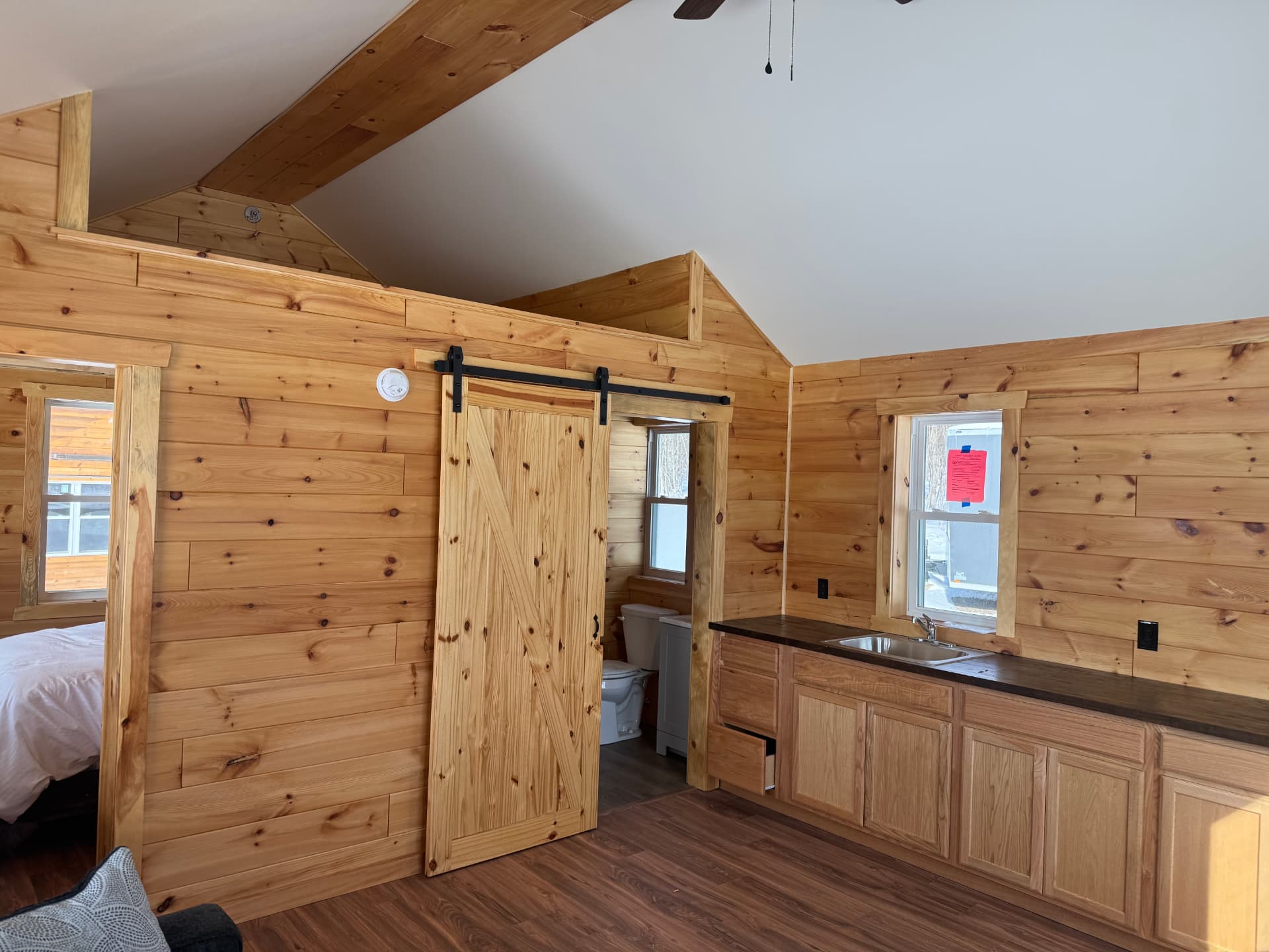 Inside a Greenway cabin: kitchenette and indoor bathroom